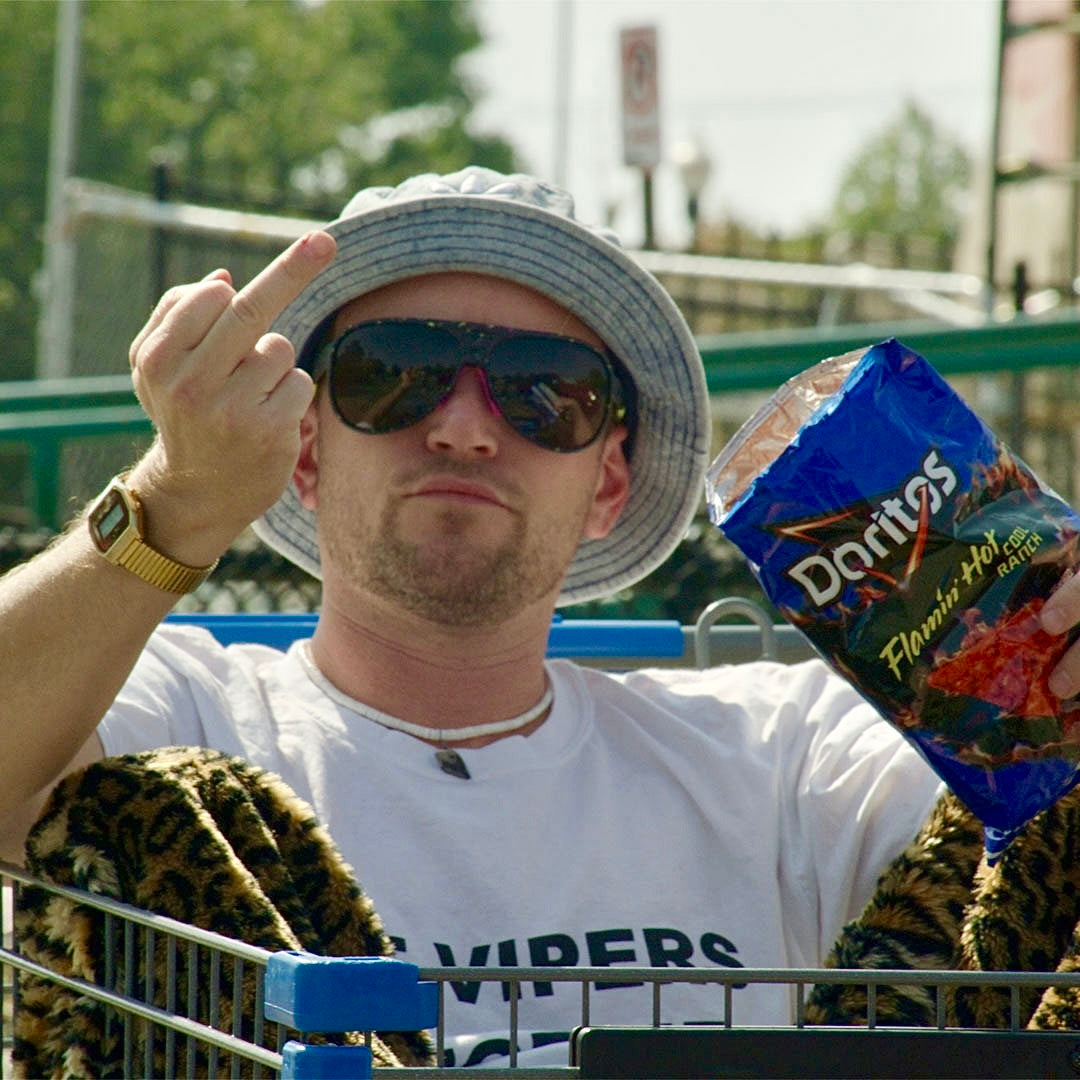 / Smoke | Man in a shopping cart wearing Pit Viper Sunglasses