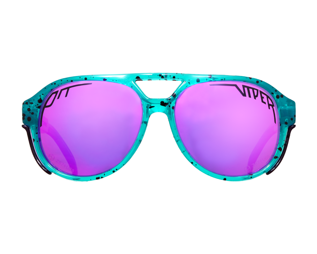 Person wearing THE 6 TO MIDNIGHT Polarized Exciters sunglasses with reflection of sunset