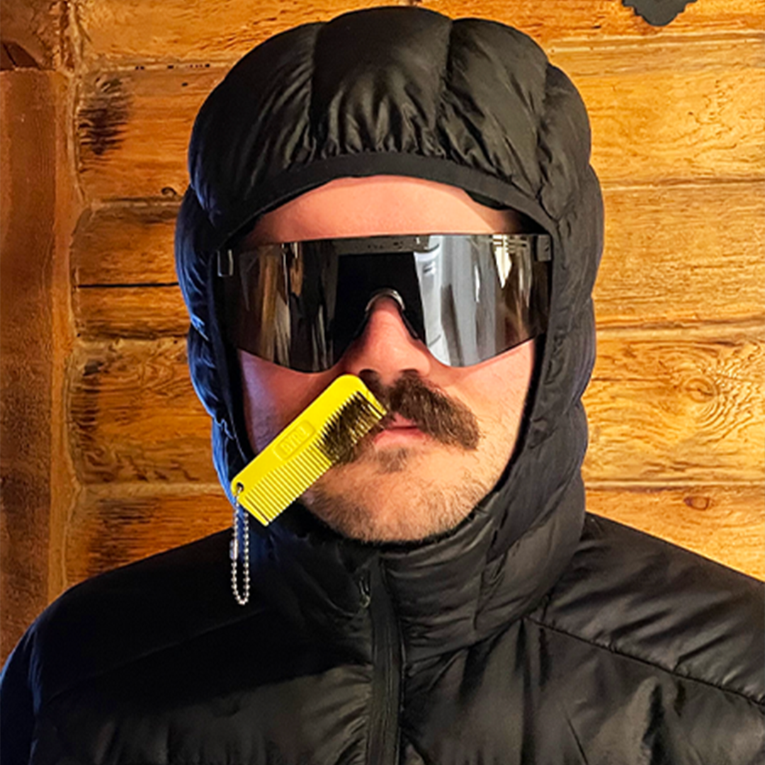 / Polarized Mirror | Man with a comb in his mustache wearing Pit Viper Sunglasses