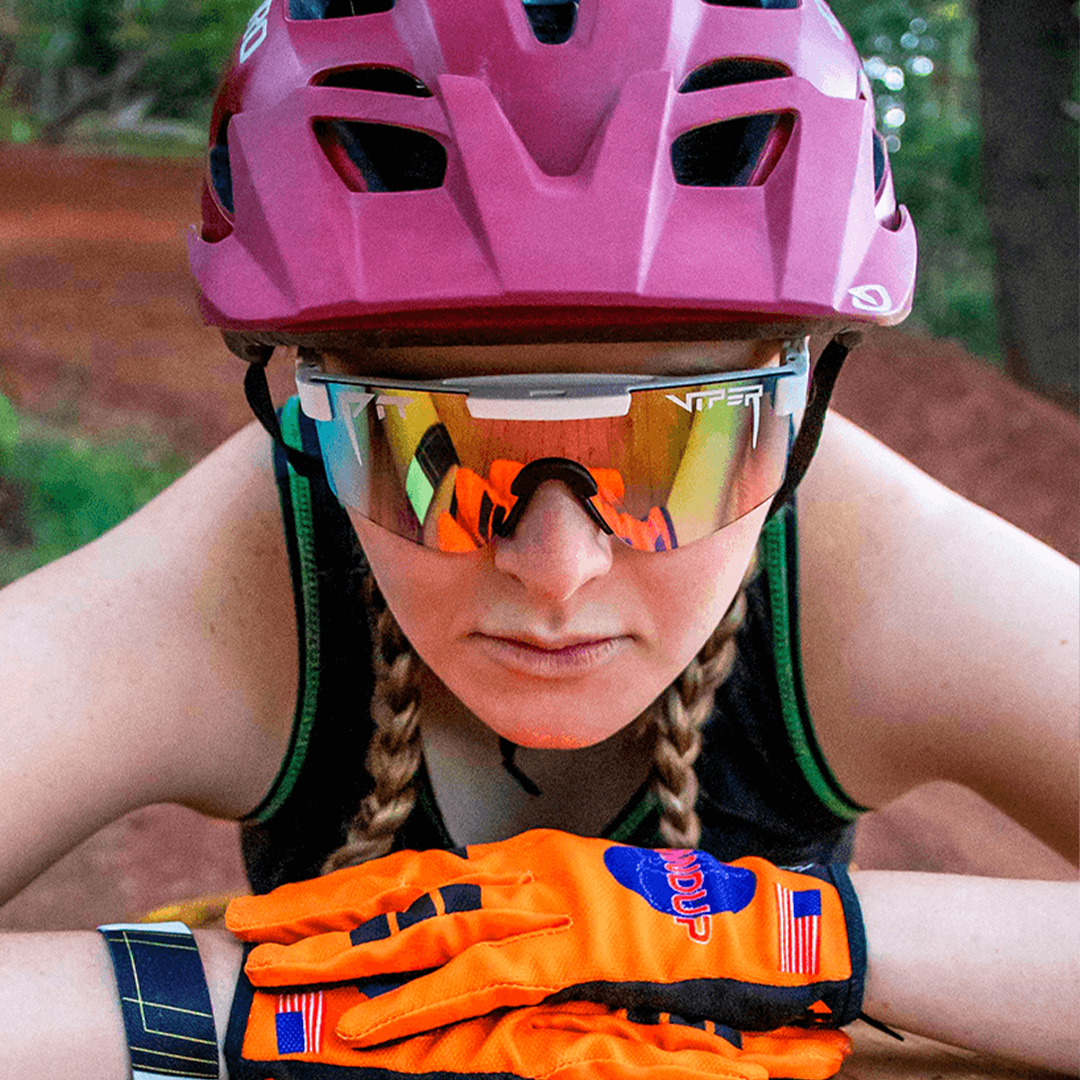 Narrow / Pink Fade | woman wearing a bike helmet and The Miami Nights Original from Pit Viper Sunglasses