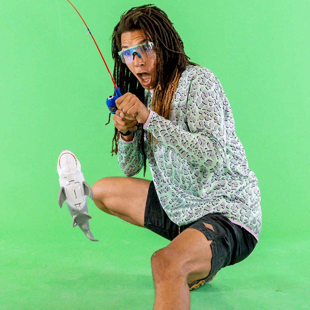 Wide / Blaster | Man catching a fake fish wearing The Poseidon Original from Pit Viper Sunglasses