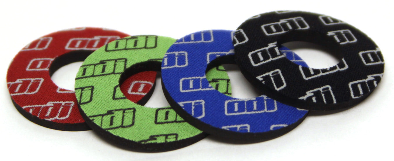 Colorful grip donuts designed for enhanced traction and comfort on sports equipment.