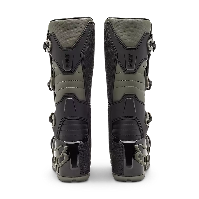 COMP X BOOT, a high-performance boot designed for comfort and durability, featuring a sleek black design and rugged sole, ideal for outdoor activities.