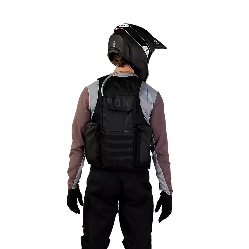 LEGION TAC VEST in black color displayed on a mannequin, showcasing its tactical design and multiple pockets.