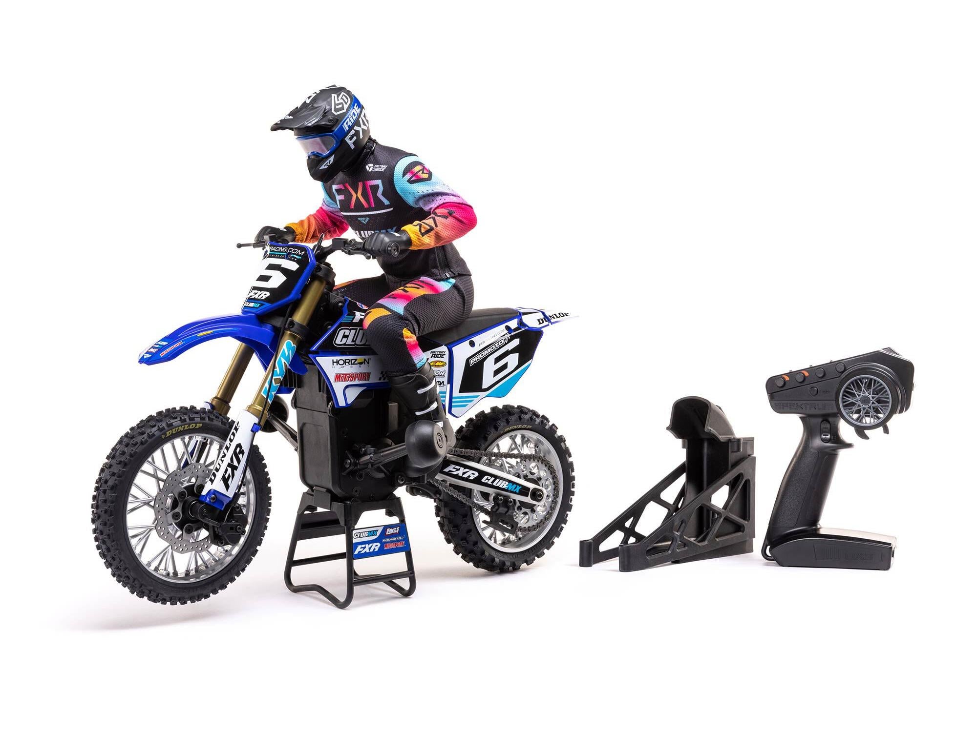 1/4 scale Promoto-MX Motorcycle RTR in Club MX blue color on display