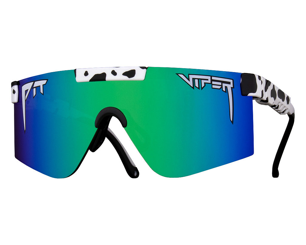 Person wearing The Cowabunga Polarized 2000s sunglasses, showcasing the sleek, retro design with mirror lenses.