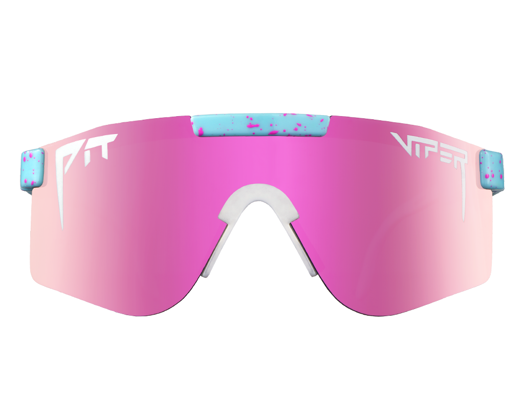 Man wearing The Gobby Polarized Double Wide sunglasses with wide frame design, showcasing reflective lenses and vibrant detailing on arms.