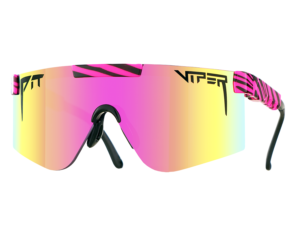 The Hot Tropics Polarized 2000s sunglasses with vibrant frame designs on a sunny beach backdrop