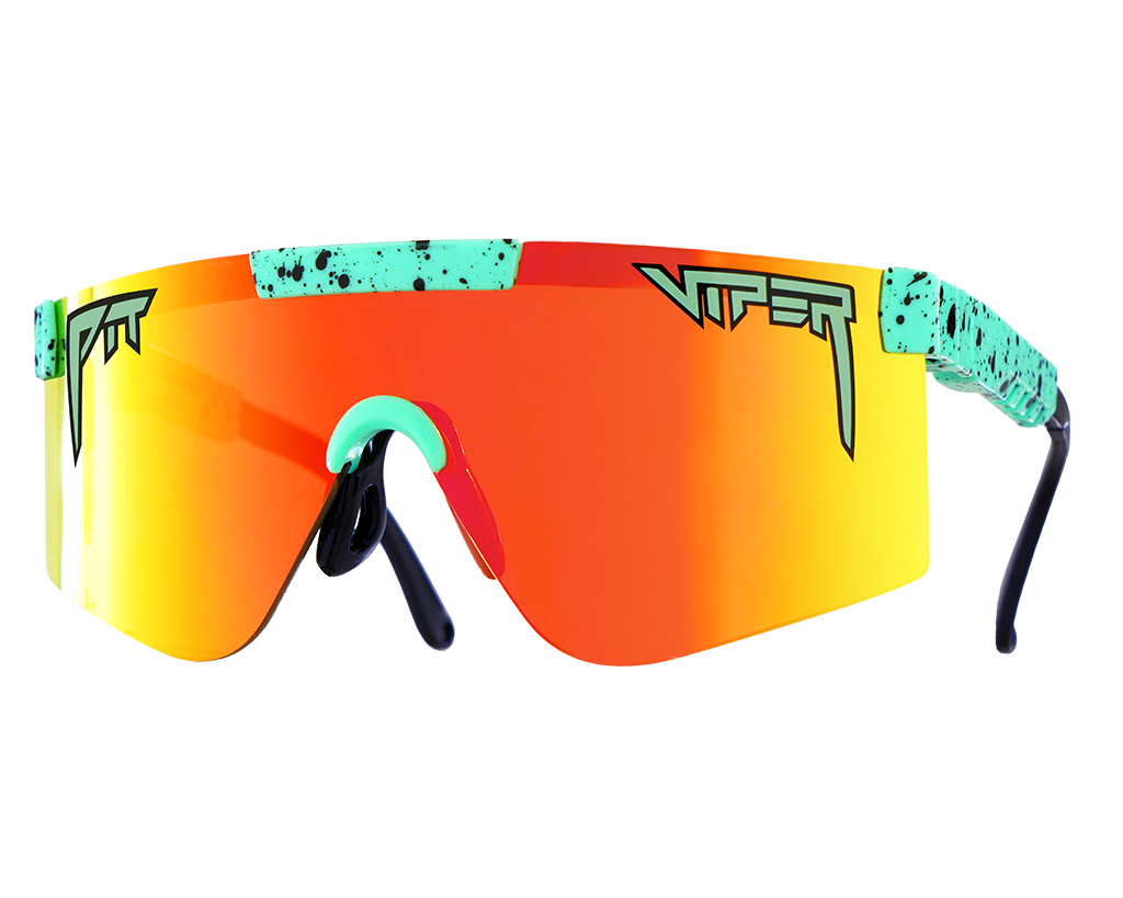 Man wearing The Poseidon Polarized 2000 Sunglasses with ocean backdrop