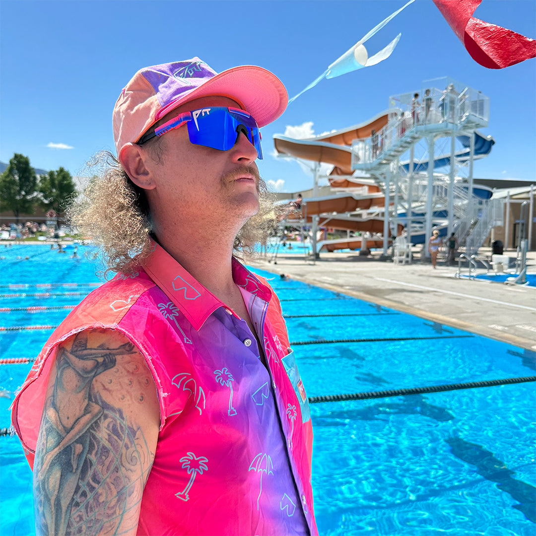 Wide / Polarized Blue | Man at a pool wearing The Leisurecraft Original from Pit Viper Sunglasses