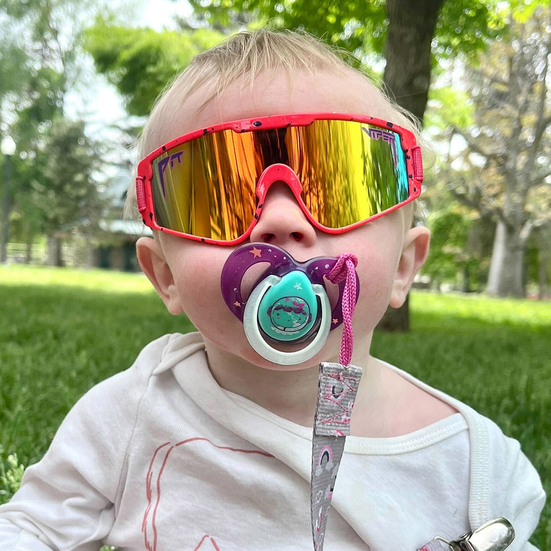 / Rainbow | Baby with a passafire in The Radical Baby Vipes from Pit Viper Sunglasses