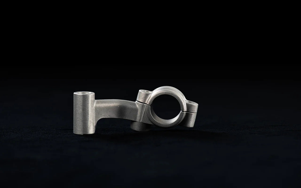 Left handguard bracket (rear foot brake)