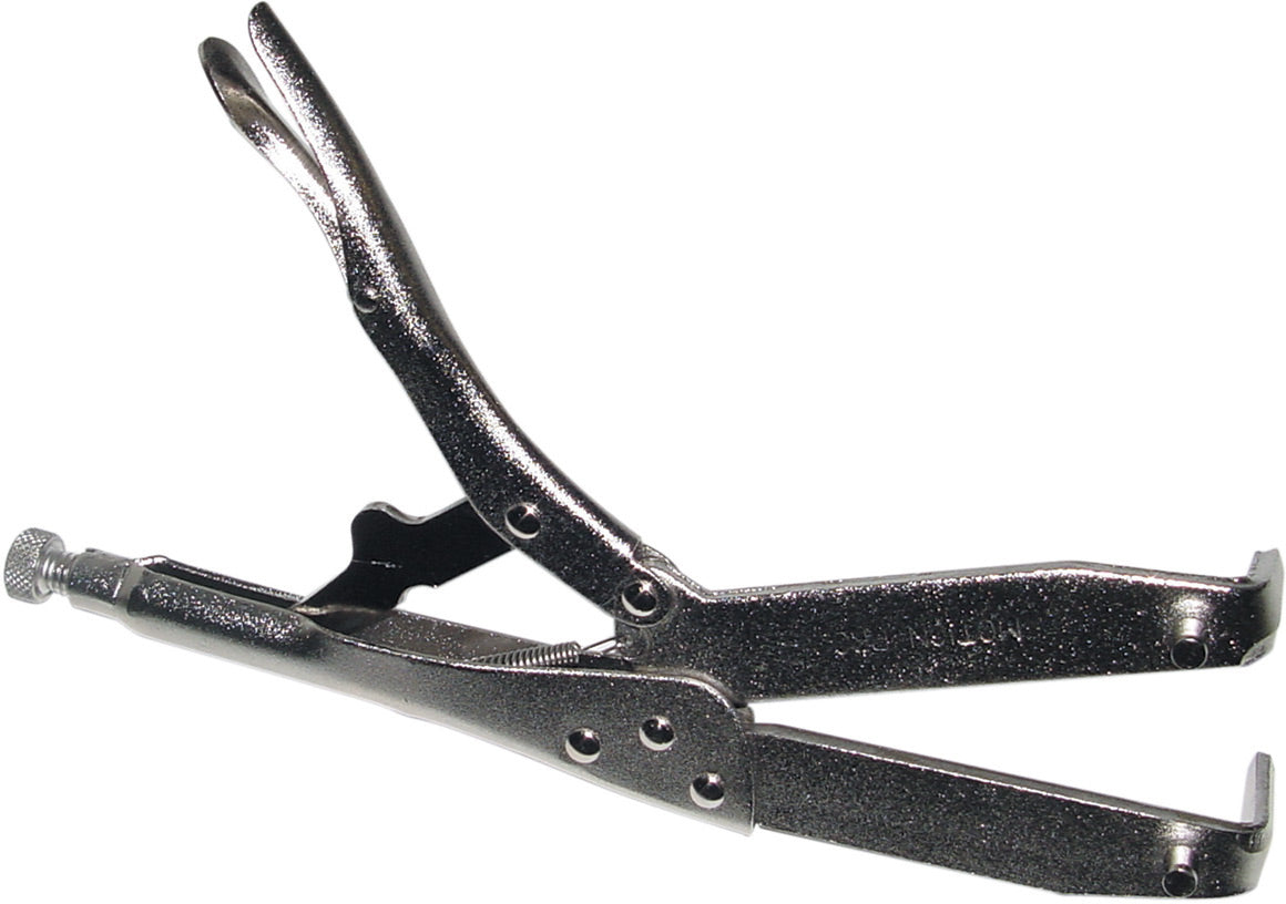 Clutch holding tool designed for safely gripping and securing clutches during automotive repair and maintenance tasks.