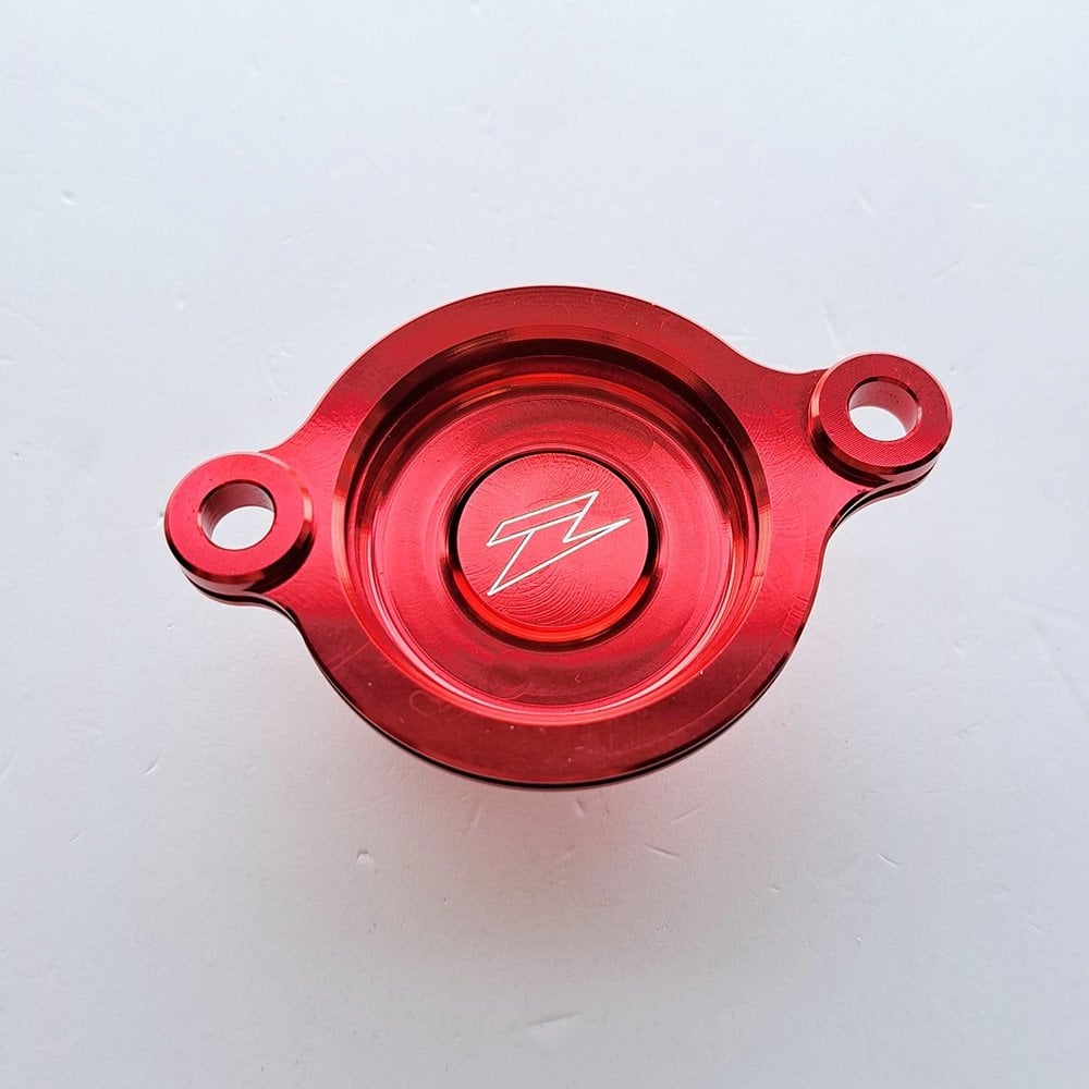 Red oil filter cover for CRF450R models years 2017 to 2022