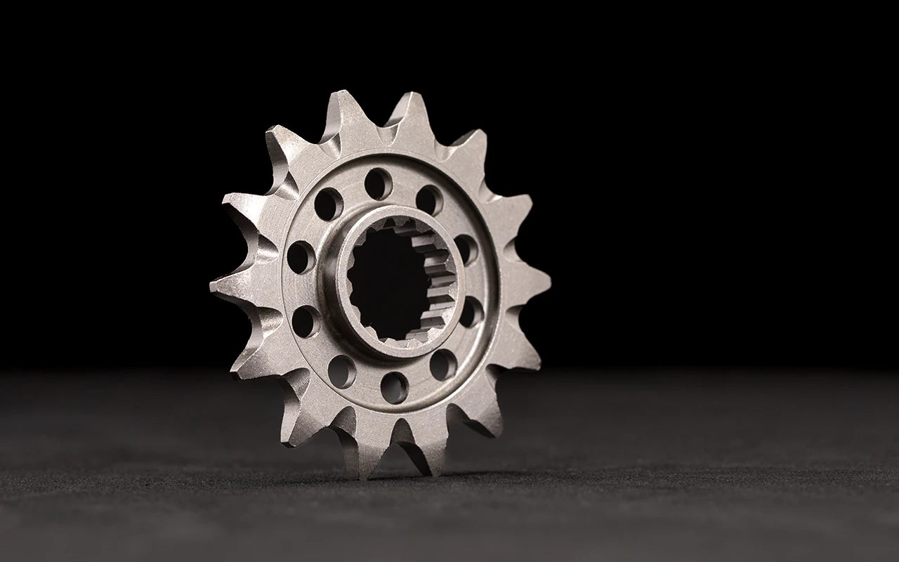 Front sprocket for motorcycles, close-up view on white background